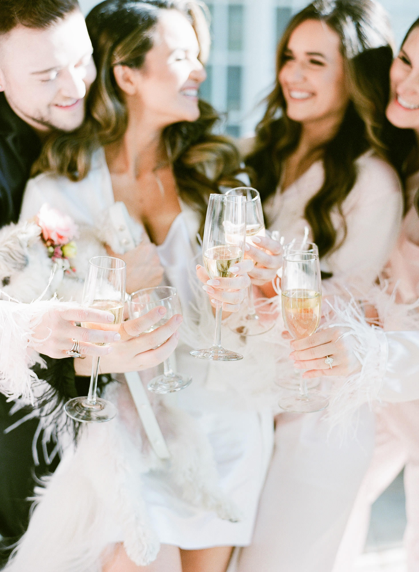 bridal party getting ready and celebrating together