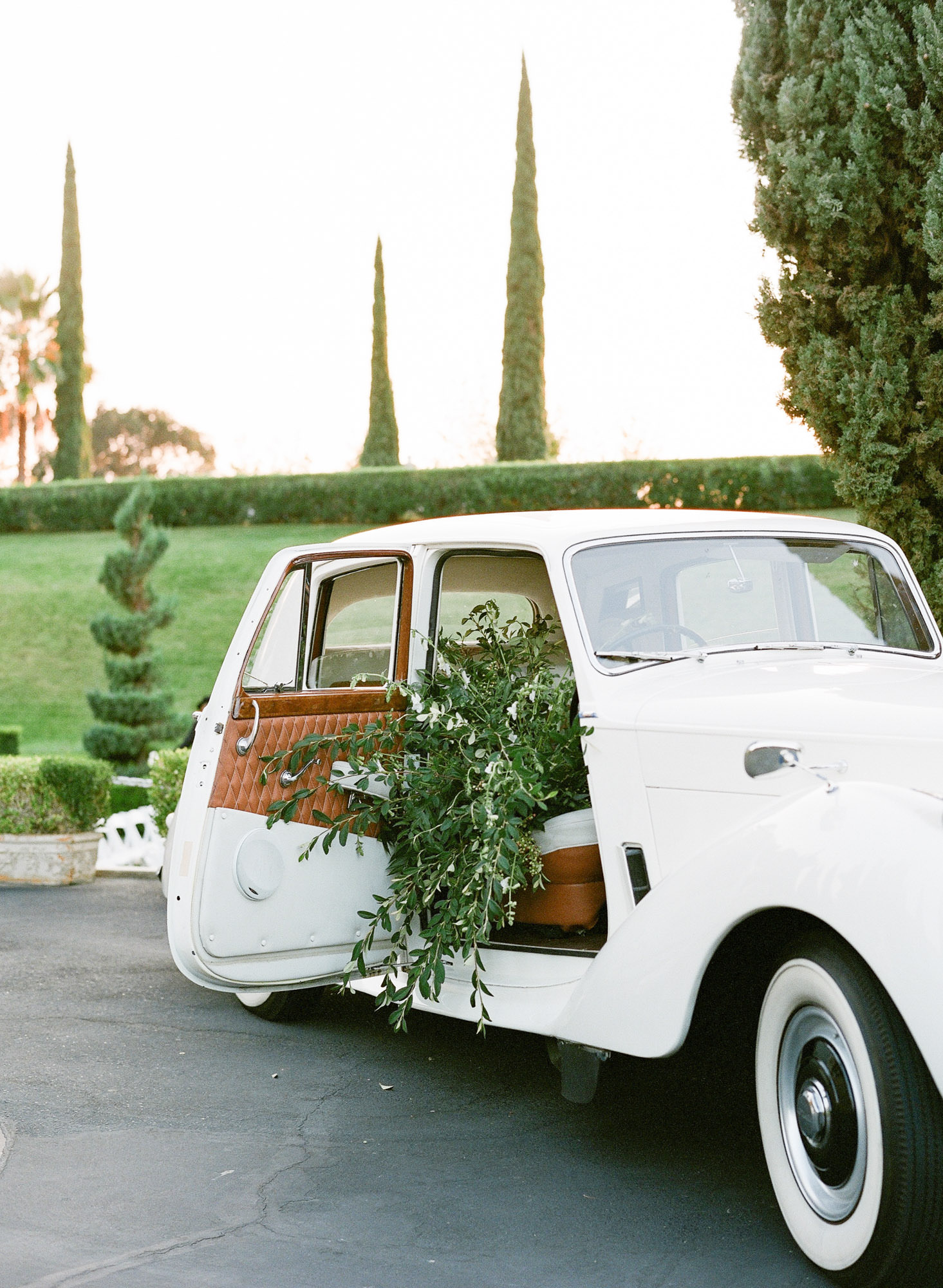 grand island mansion wedding getaway car with sactown vintage