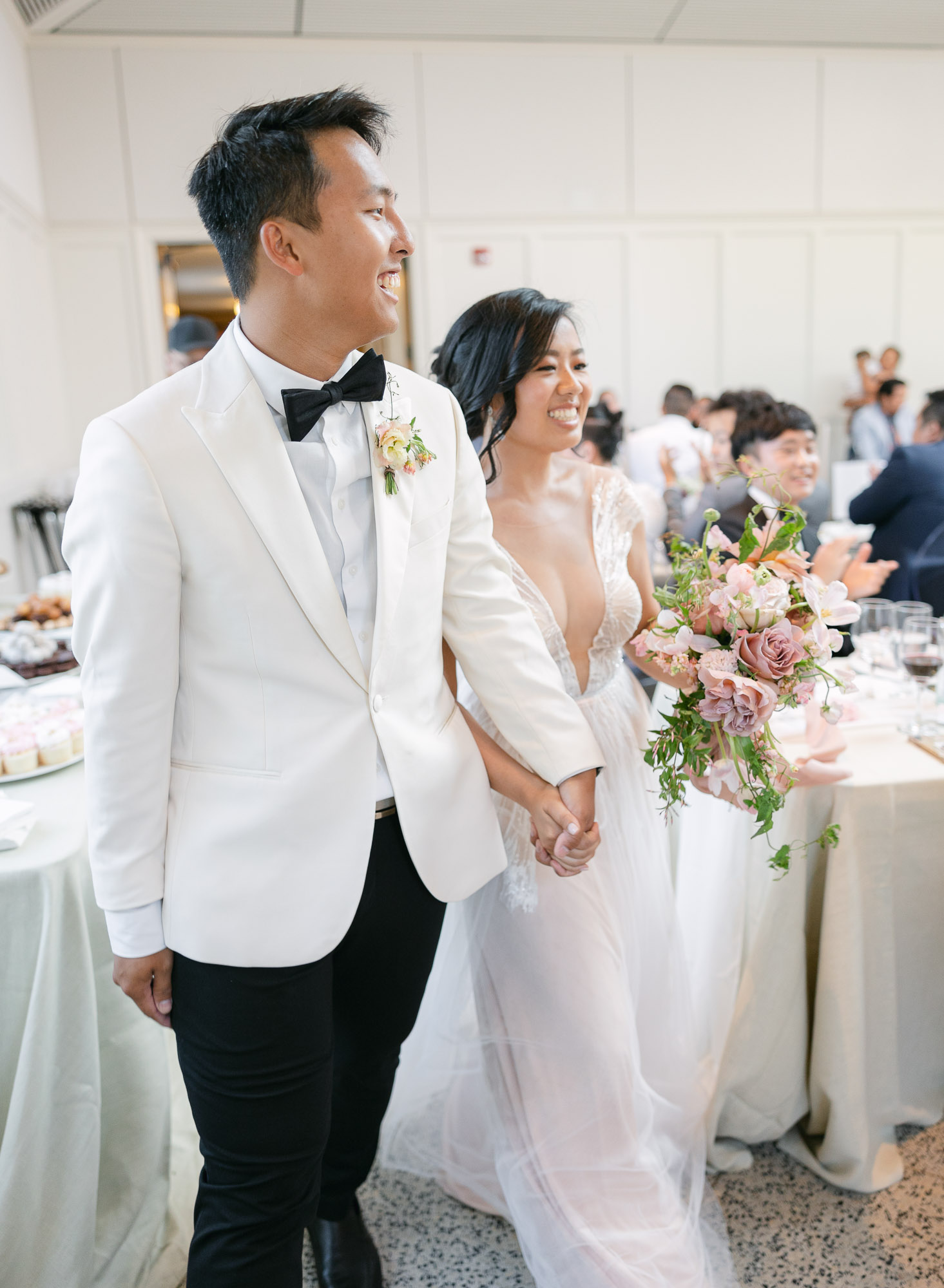 stylish bride and groom gets married at the paine art center 
