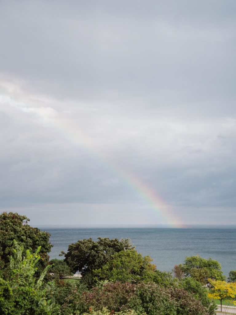 Rainbow appears over Lake Michigan